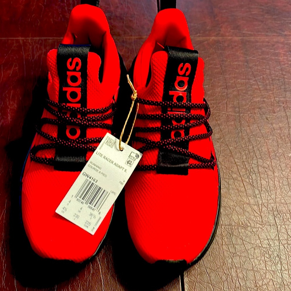 Brand new never worn Adidas Lite Racer Adapt- boys/youth size 4.5